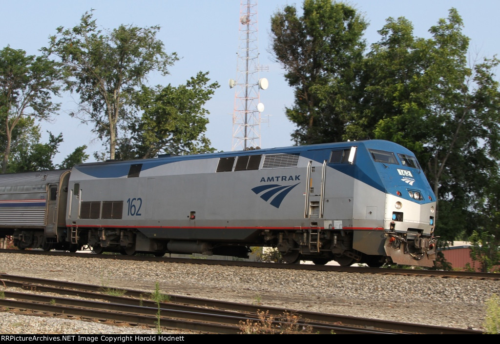 AMTK 162 leads train 80 eastbound